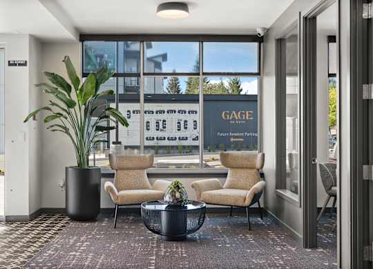 A living room with a large window and a sign that says