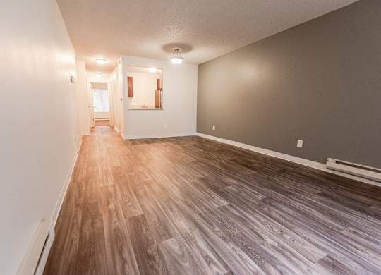 Lakewood Apartments - Bellmary Park Apartments - Living Room, Entryway, and Kitchen at Bellamy Park Apartments , Washington