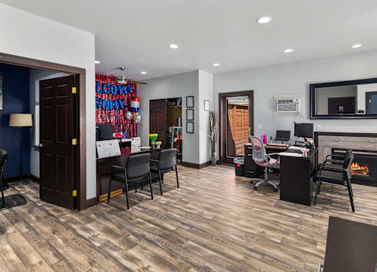 A modern living room with a fireplace and a dining area.