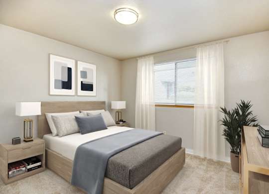 A bedroom with a bed, nightstand, and a plant.