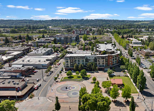 A cityscape with a large open square in the middle.