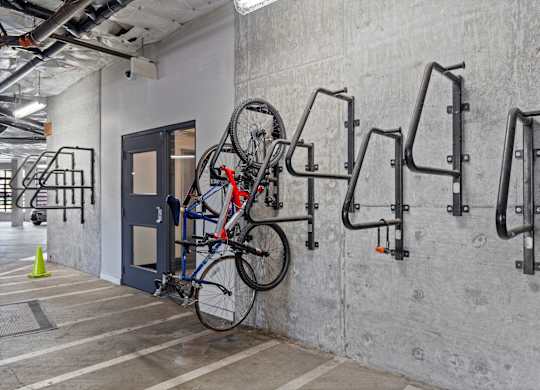 A bicycle is parked on a bike rack.