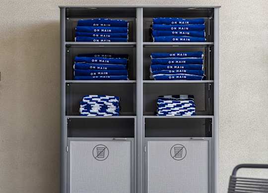 A shelf with blue and white items on it.