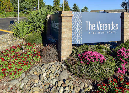 The Verandas Apartment Homes sign is displayed in front of a landscaped area.
