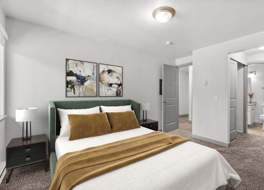A bedroom with a bed, nightstand, and a painting on the wall.