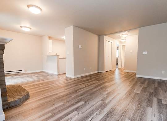 Living Room, Fireplace, Dining Room, Kitchen, and Entryway at Cambridge on Seventh, Puyallup