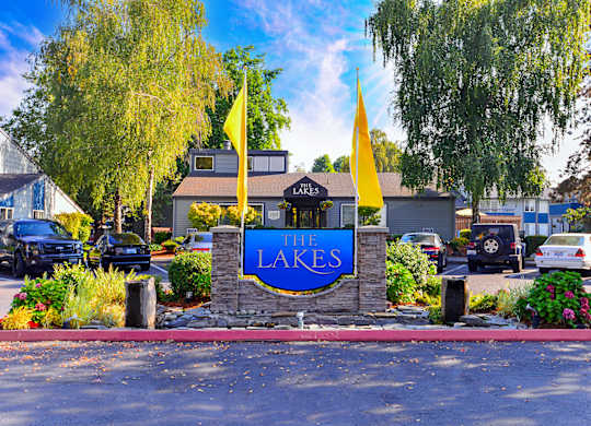 a sign for the lakes in front of a parking lot at The Lakes at Fife, Fife, Washington