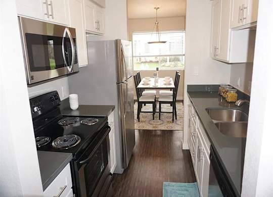 Bellevue  Apartments- Parc3 Apartments- kitchen
