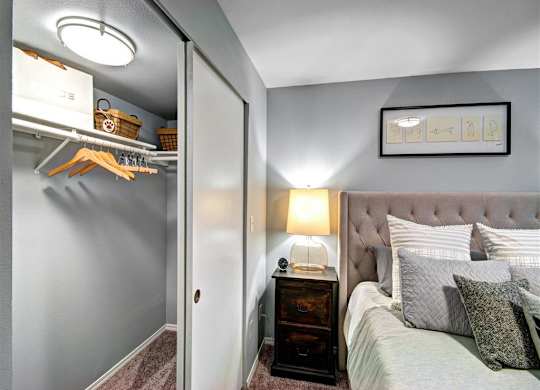 Bedroom with closet at Deer Creek Apartments, Puyallup, WA