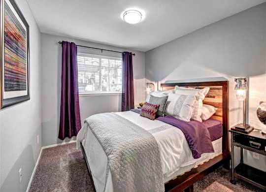 Puyallup Apartments- Deer Creek Apartments- bedroom at Deer Creek Apartments, Puyallup, Washington