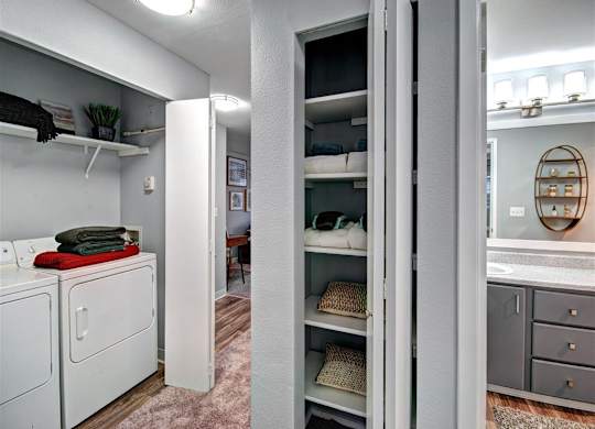Puyallup Apartments- Deer Creek Apartments- hallway - closet at Deer Creek Apartments, Puyallup, WA, 98373