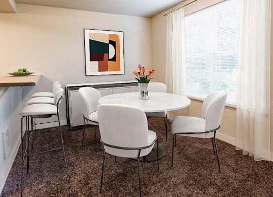 A dining room with a white table and chairs.