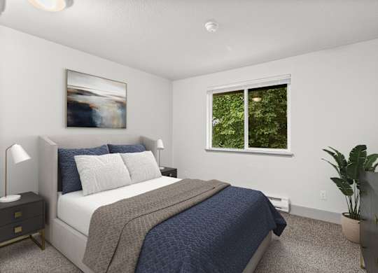 A bedroom with a large bed and a window.