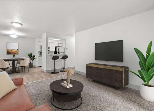 A living room with a brown leather couch, a coffee table, a television, and a potted plant.