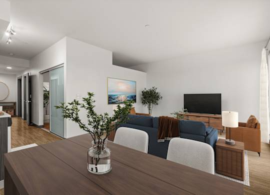 A modern living room with a wooden table and a blue couch.