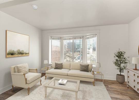 A living room with a beige couch, chair, and coffee table.