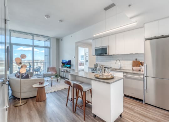 Fitted Kitchen With Island Dining at BLVD Beltline, Alberta, T2G 2K4