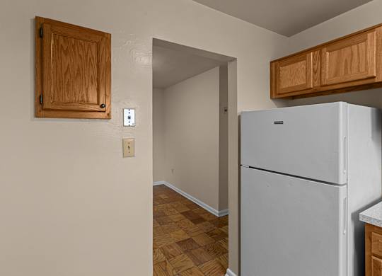 A white refrigerator in a kitchen at Kensington House, Kensington, MD