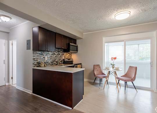 Large Center Island Kitchen at The Lawrence Apartments, Greenbelt