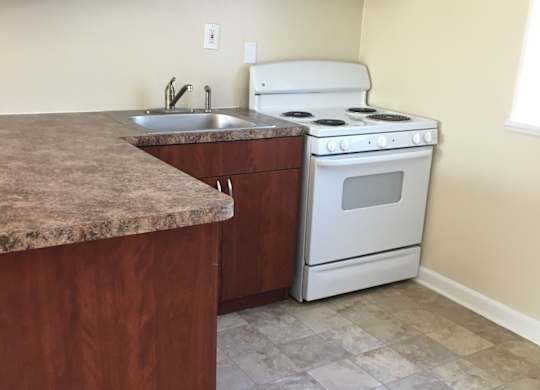 Kitchens With Ample Storage at The Lawrence Apartments, Maryland 20770