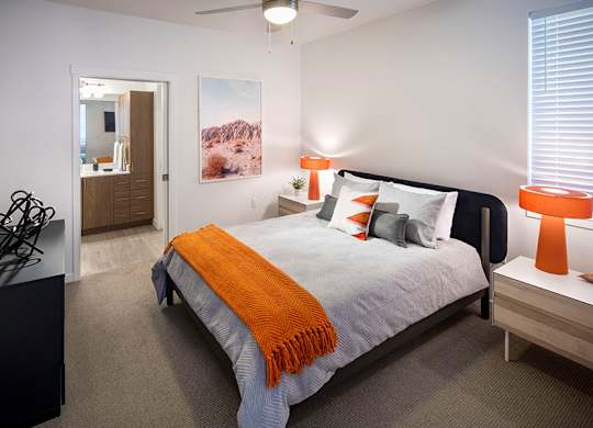 Bedrooms include ceiling fans and carpeted floors