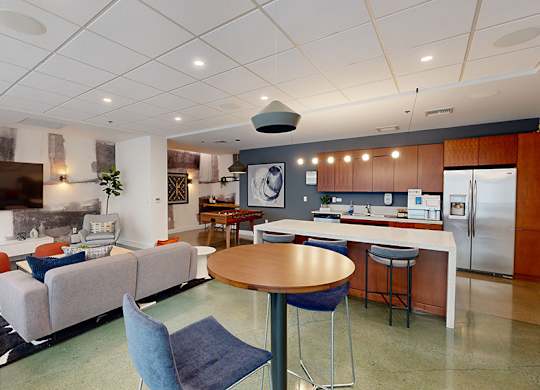 The Matisse apartments for rent by Tillicum Bridge - Game room with consoles large screen TV
