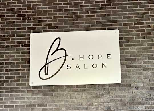 A white sign with the word