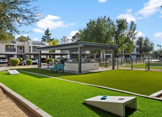 Del Sol Apartments Courtyard with BBQ's and Corn Hole