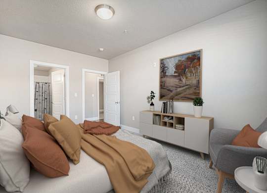 A bedroom with a bed, a chair, and a painting on the wall.