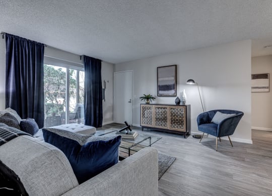 a living room with a couch and a chair