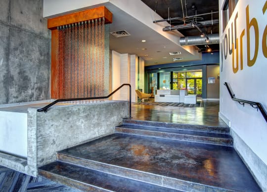a view of the lobby from the top of the stairs