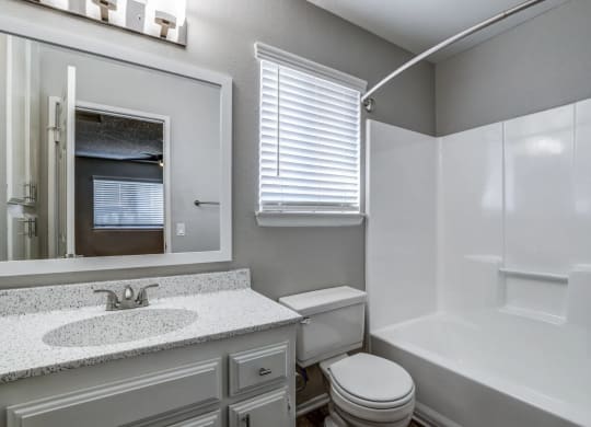 a bathroom with a sink and a toilet and a shower at Aspire Seneca, Victorville, 92392
