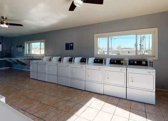 Washers, Dryers, and Folding Station at Las Brisas Apartments, Colton