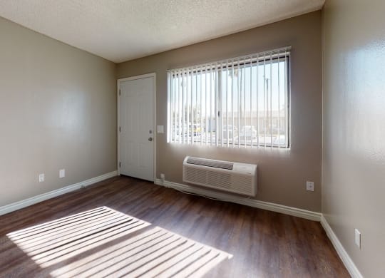 Bedroom Apartment Living Room with Hardwood Flooring at Las Brisas Apartments, California