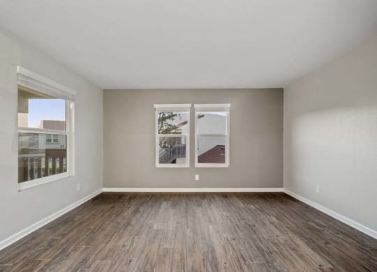an empty room with two windows at Aspire Corona, Corona, CA 92882