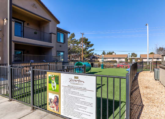 dog park with a sign at Riverton of the High Desert Apartments, CA, 92392