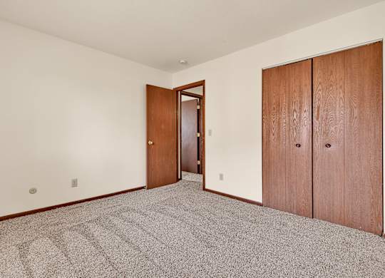Carpeted Bedroom at Windsor Crest Apartments, Davenport , Iowa