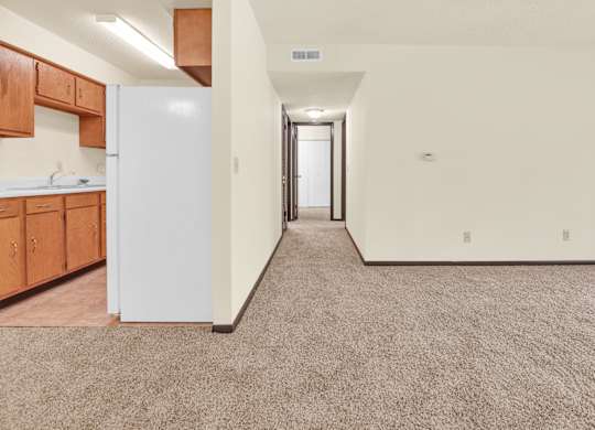 Kitchen And Living Area at Indian Ridge Apartments, Iowa