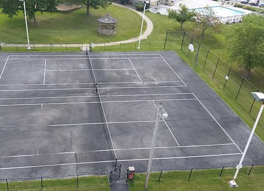 A tennis court at Indian Ridge Apartments, Davenport