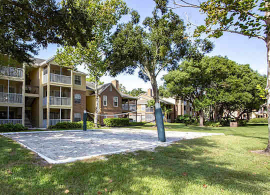 Apartment complex with a playground in the front.