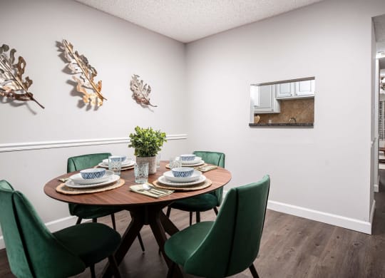 a dining room with a table and chairs  at The Park at Chesterfield Apartment Homes, Tampa, FL, 33617
