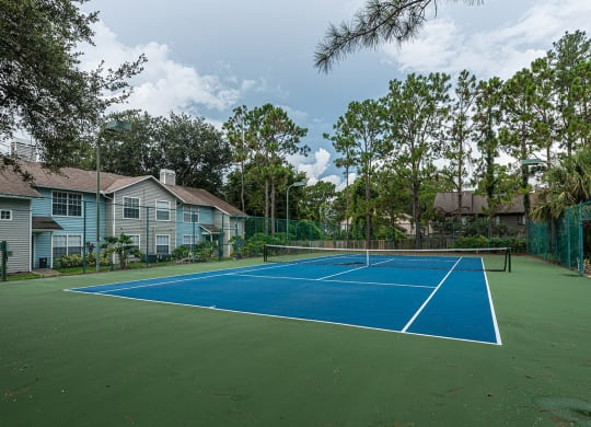 the tennis court at the preserve at ballantyne commons apartments at Madison Oaks Apartment Homes, LLC, Florida, 34684