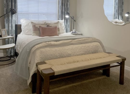a bedroom with a bed and a ceiling fan at Madison Oaks Apartment Homes, LLC, Florida, 34684