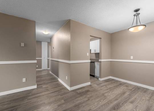 A room with a washer and dryer in it.