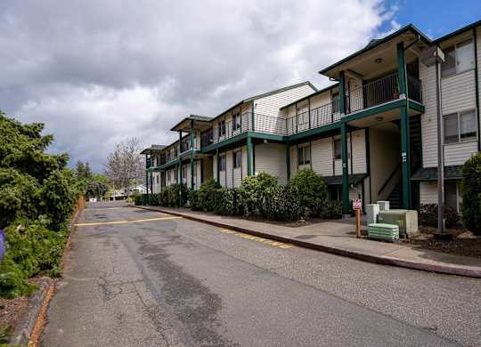 A cloudy day in front of apartment buildings.