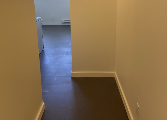 a view from the bottom of the stairs looking up to the second floor