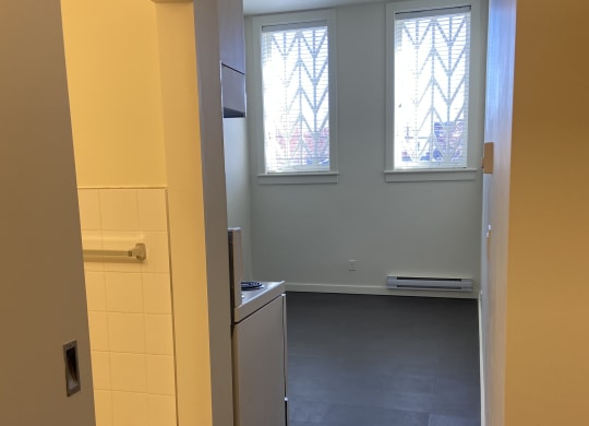 a view of the kitchen from the top of the stairs