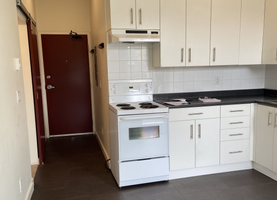 a view of the kitchen from the dining room