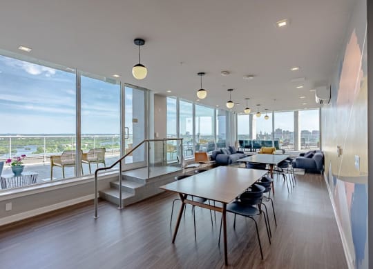 a dining room with a table and chairs