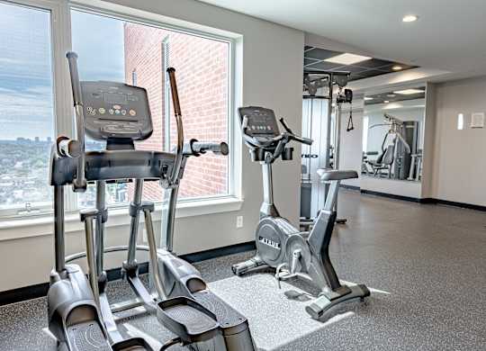 two treadmills and ellipticals in the gym at the preserve at greatstone